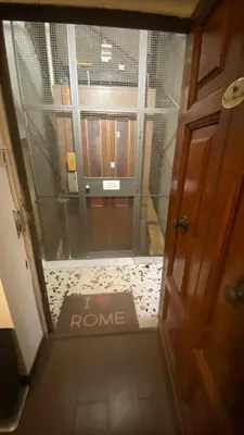 a door with a sign that says im home at B&B A Home in Rome in Rome
