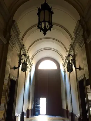 an entrance to a building with a large brown door at B&B Best Pantheon in Rome