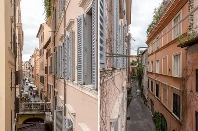 an alley in an italian city with buildings at Vittoria Street Charming in Rome