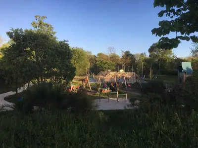 a playground in a park with a play structure at GLI ARANCI Apartment in Rome