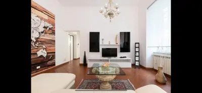 a living room with a couch and a table at IN FRONT OF COLISEUM 2 in Rome
