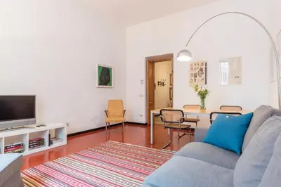 a living room with a couch and a table at Elizabeth House - WelcomeToRhome in Rome
