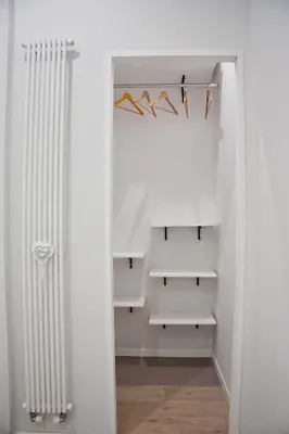 a walk in closet with a radiator in it at Vatican Luxury Corner in Rome