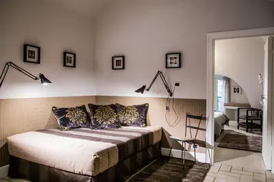 a bedroom with a bed in a room at Vatican Jewel Apartment in Rome