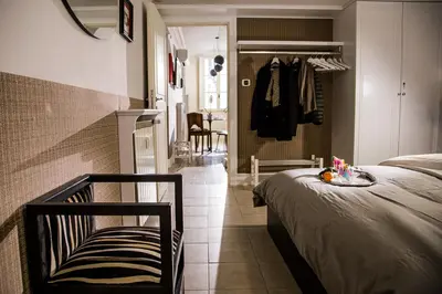 a bedroom with a bed and a walk in closet at Vatican Jewel Apartment in Rome