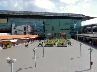 a large building with a courtyard in front of it at B&B Dea Tiburtina in Rome