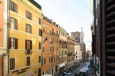a view of a city street with buildings at GREGORIANA HOUSE - Appartamento con Vista su Roma in Rome