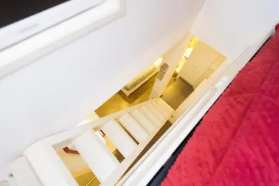 an overhead view of a room with a staircase at Pantheon Romantic Loft in Rome