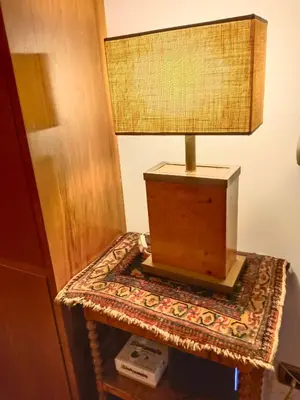a lamp sitting on top of a table at Borgo Pio San Pietro Apartment in Rome