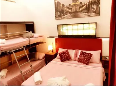 a room with two bunk beds in a room at affittacamere sereno in Rome