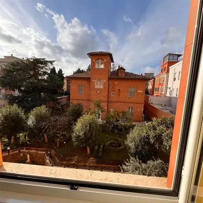 a view of a building from a window at La Casa di Nazareth in Rome
