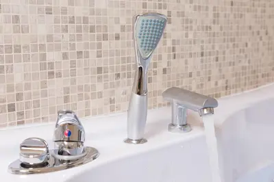 a toothbrush sitting on top of a sink at Suite House Vaticano in Rome
