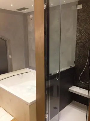 a bathroom with a shower and a bath tub at Wrooms Guest House in Rome