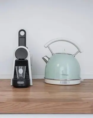 a toaster and a blender sitting on a wooden floor at 500 Suite Prati delle Vittorie in Rome