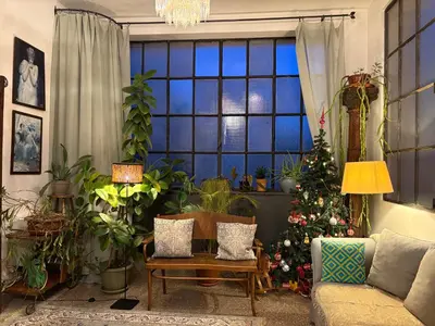 a living room with a couch and a table at La Casa di Silvestro in Rome