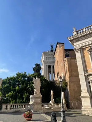a building with a statue in front of it at Frattina 57 in Rome