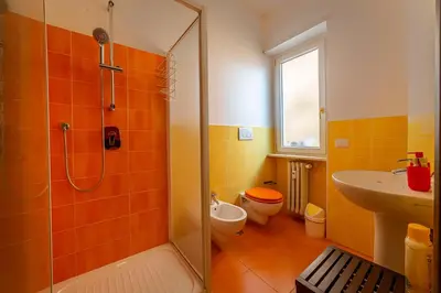 a bathroom with a shower and a toilet and a sink at Difronte Ai Musei Vaticani in Rome