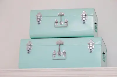 a group of three blue boxes with handles at Vaticano terrace: brand new 2 bedrooms 2 bathrooms in Rome
