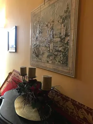 a dining room with a table with candles on it at La Casa di Elena in Rome