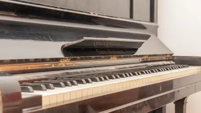 an old piano is sitting in a room at Rental In Rome Ancient View in Rome