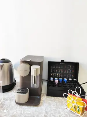 a coffee maker and a toaster on a counter at La Casa di Emanuela in Rome