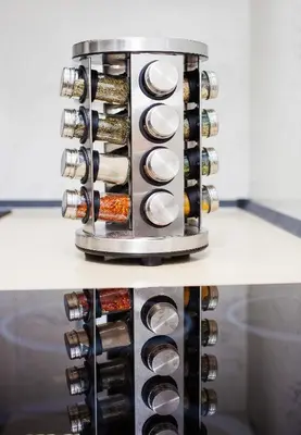 a spice rack in a kitchen with at The Brunetti - Luxury serviced apartment in Rome