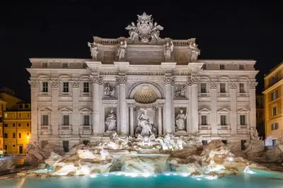 a large building with a fountain in front of it at Fontana di Trevi Diamond Boutique in Rome