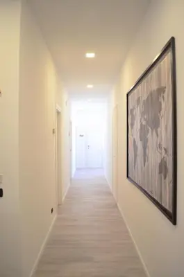 a hallway with a painting on the wall at Gianicolo Country Room in Rome
