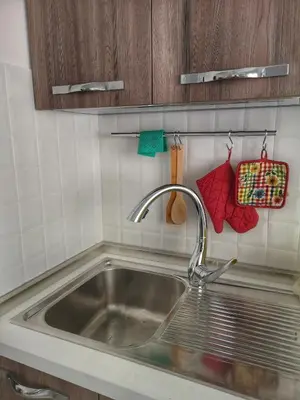 a sink in a kitchen with a sink at Casa Vacanza Katiuscia in Rome