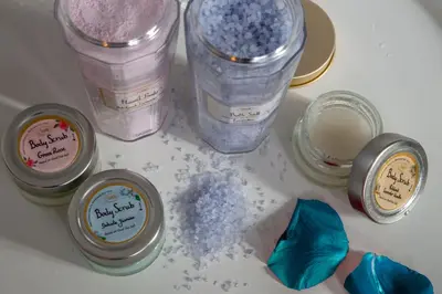 a group of four jars of lavender and purple cosmetics at Almaìt in Rome