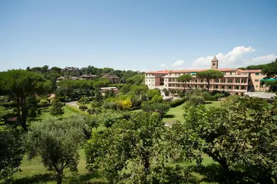 a view of a campus with trees and buildings at Mons Aureus Resort in Rome