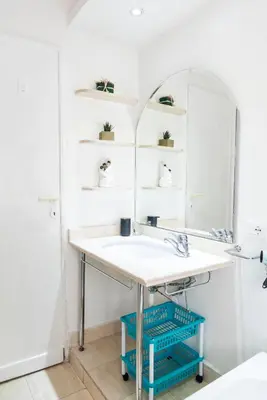 a bathroom with a sink and a mirror at Merulana Suite S.Peter in Rome