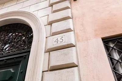 a building with the number on the side of it at Trevi Chic House in Rome