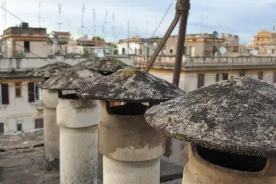 a group of stone columns with mushrooms on them at Casa Ferrari Testaccio e Trastevere Wi-Fi free in Rome