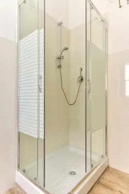a shower with a glass enclosure in a bathroom at Trastevere Queen in Rome