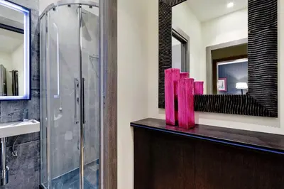 a bathroom with a shower and a sink at Houses&HousesVEDOROMA in Rome