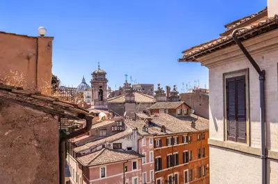 a view of the city from the roofs of buildings at Maison d'Art Apartments - Maison d'Art Collection in Rome