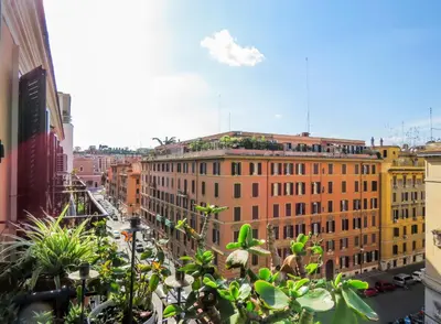 a view of a city street with buildings at House Candia 111 - Vatican Museum apartment in Rome