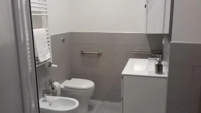 a small bathroom with a toilet and a sink at MCM in Rome