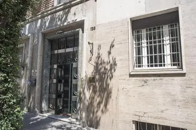 a building with a door and a window at Winkler Suites in Rome