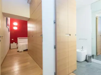 a bathroom with a tub and a sink in a room at Spagna Sistina 143 in Rome