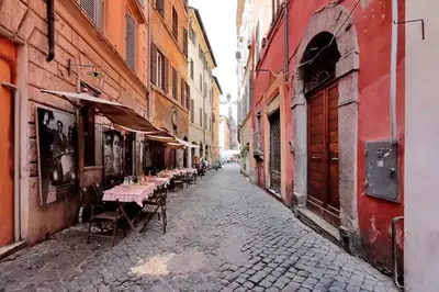a group of buildings with windows and shutters on them at Confortevole Appartamento nel Centro Storico con 2 camere AC WiFi in Rome