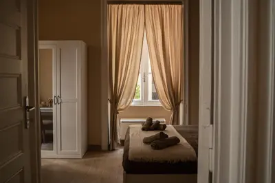 a bedroom with a bed with two teddy bears on it at Sogno di un'epoca in Rome