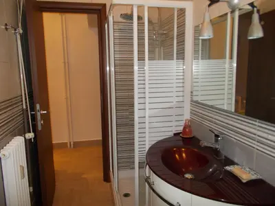 a bathroom with a sink and a mirror at Milla's house rome in Rome