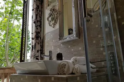 a bathroom with a sink and a mirror at A casa di Juno 