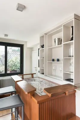 a kitchen with a large island in a room at Idyllia - Penthouse in Navona Area in Rome