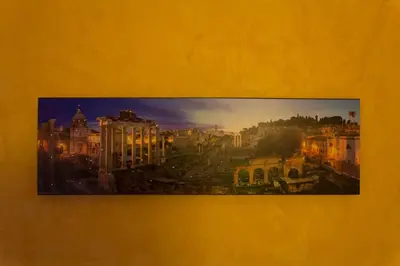 a picture of a city on a yellow wall at Affittacamere Mazzini in Rome
