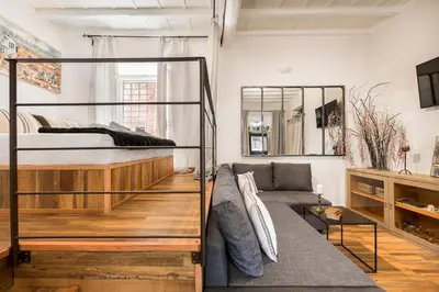 a living room with a bunk bed and a couch at iFlat Trastevere Bianca's House in Rome