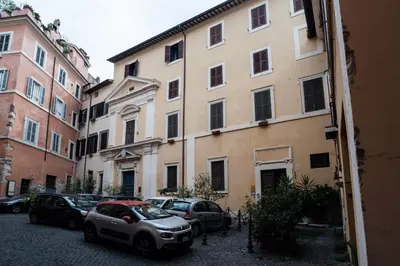 a group of cars parked in front of a building at Minerva Monks Inn in Rome