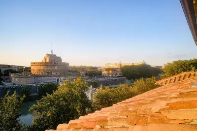 a view of the city from the roof of a building at Appartamento a Castel Sant'Angelo con terrazza in Rome
